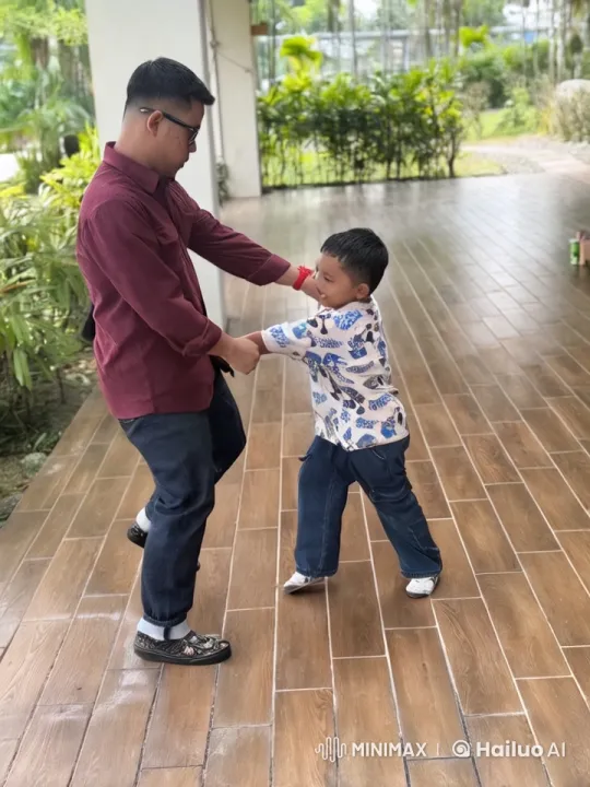 Boys Practice Kungfu on Wooden Deck Amidst Greenery – AI Generated Video | Hailuo AI