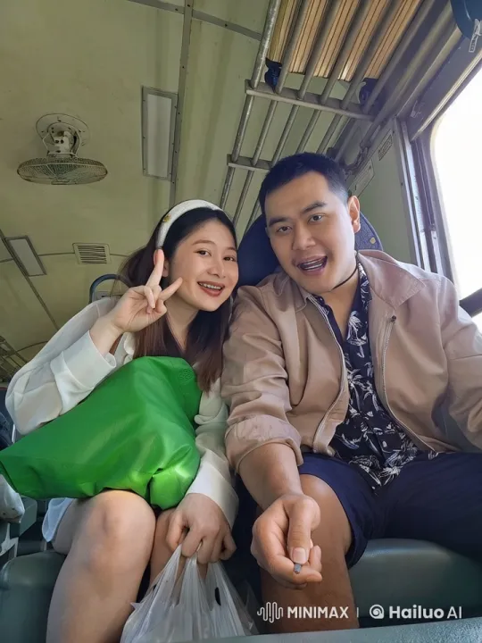 Young Couple Enjoying a Peaceful Train Ride – AI Generated Video | Hailuo AI