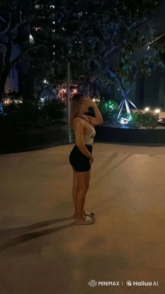 Young Woman Performing Dynamic Kungfu in Night Setting – AI Generated Video | Hailuo AI