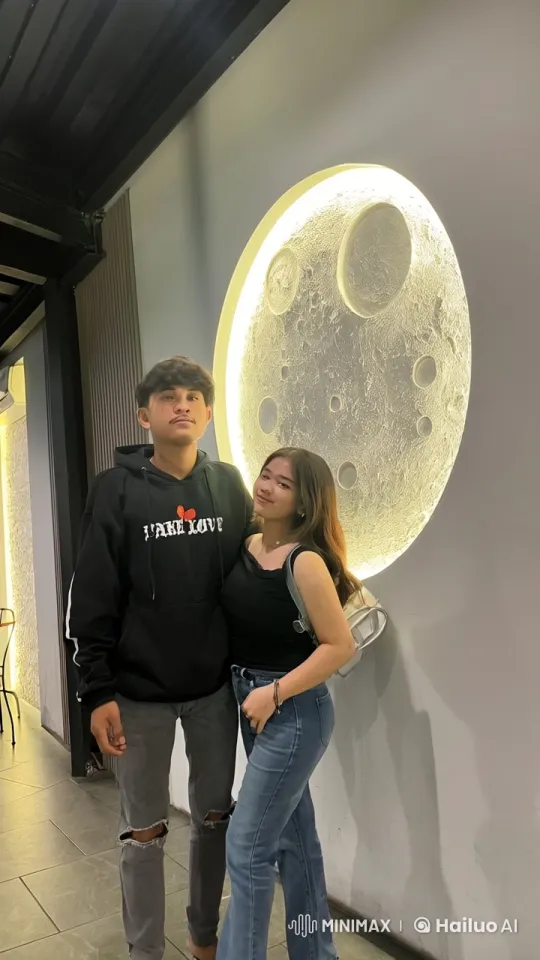 Young Couple's Playful Kung Fu Fight in Front of Lunar Mural – AI Generated Video | Hailuo AI