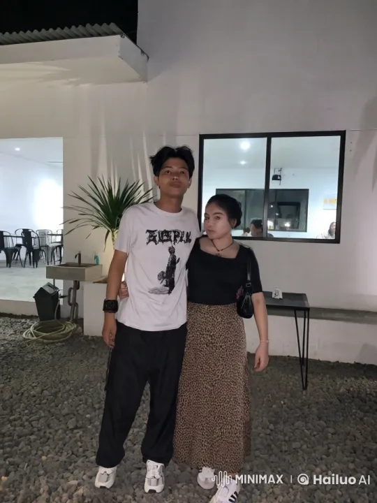 Nighttime Kung Fu Display by Young Duo Outside Modern Building – AI Generated Video | Hailuo AI
