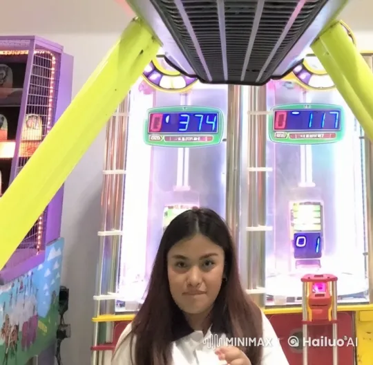 Young Woman Celebrates Intensely at Vibrant Arcade – AI Generated Video | Hailuo AI