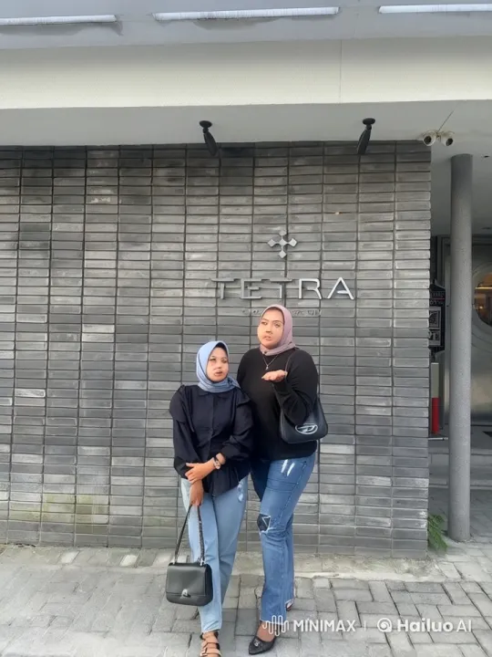 Two Women Practice Kungfu in Front of TETRA Building – AI Generated Video | Hailuo AI