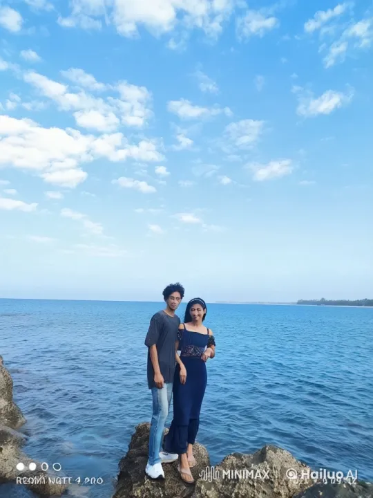 Couple Practicing Kung Fu on Rocky Shoreline – AI Generated Video | Hailuo AI