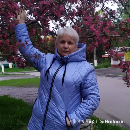 Animated Person Touching Blossoming Tree in Suburban Setting – AI Generated Video | Hailuo AI