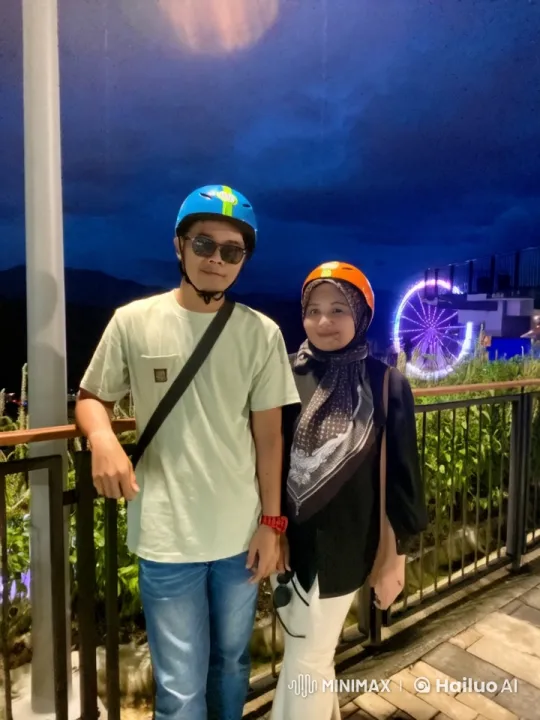 Martial Arts Display by Couple with Ferris Wheel Background – AI Generated Video | Hailuo AI