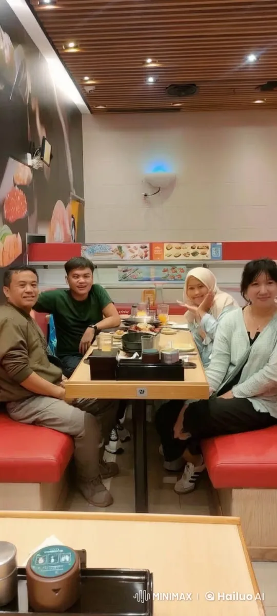 Friends Enjoying a Meal in a Warm Restaurant Setting – AI Generated Video | Hailuo AI