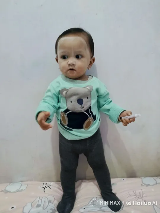 Child Practicing Playful Kungfu on Bed – AI Generated Video | Hailuo AI