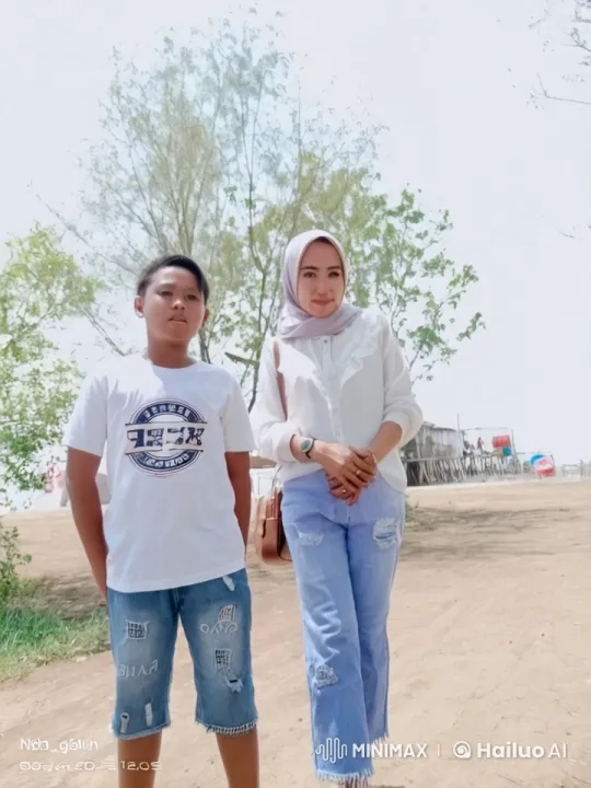 Young Boy and Woman Perform Kung Fu in Outdoor Scenery – AI Generated Video | Hailuo AI