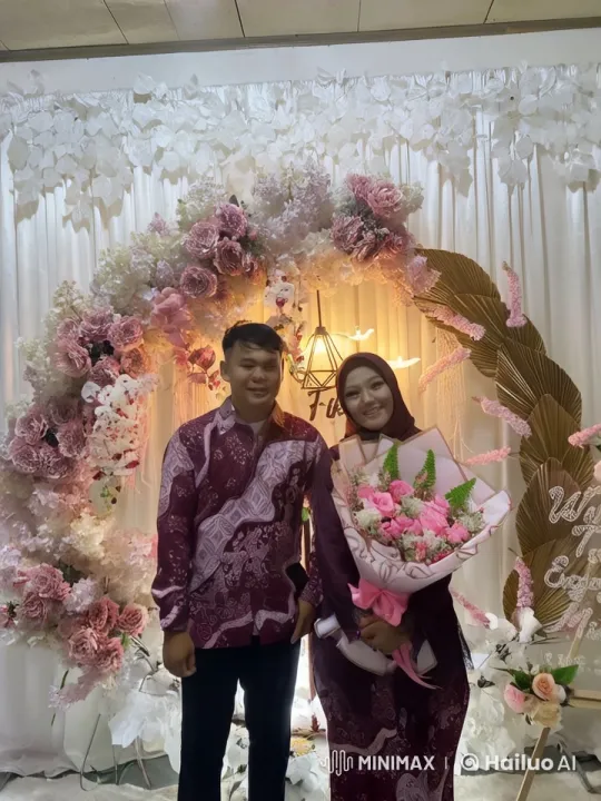 Couple's Kung Fu Routine in Floral Arch Setting – AI Generated Video | Hailuo AI