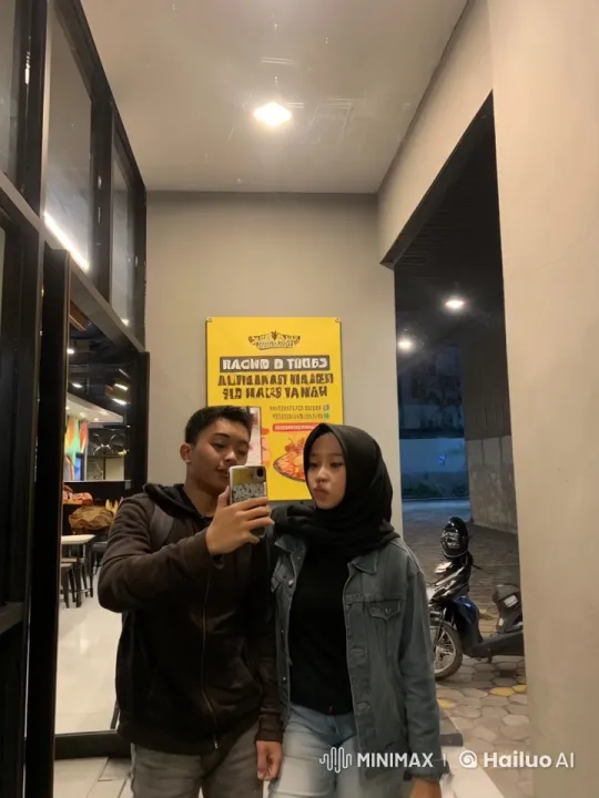Young Couple's Playful Martial Arts Display in Modern Restaurant – AI Generated Video | Hailuo AI