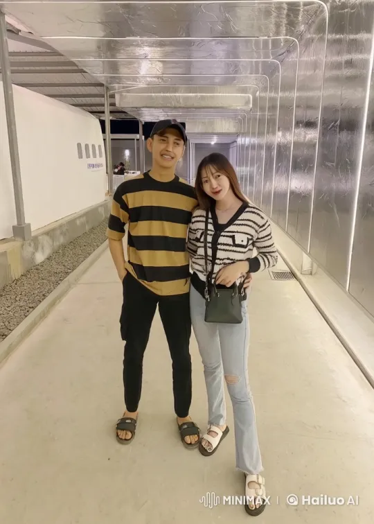 Couple Performs Synchronized Kungfu in Metallic Tunnel – AI Generated Video | Hailuo AI