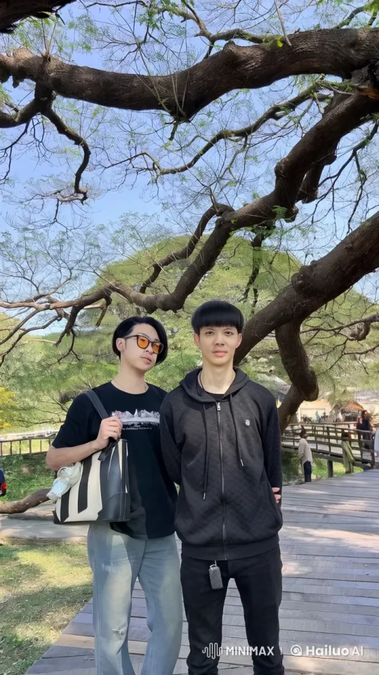 Two Young Men Perform Synchronized Kung Fu in Park – AI Generated Video | Hailuo AI