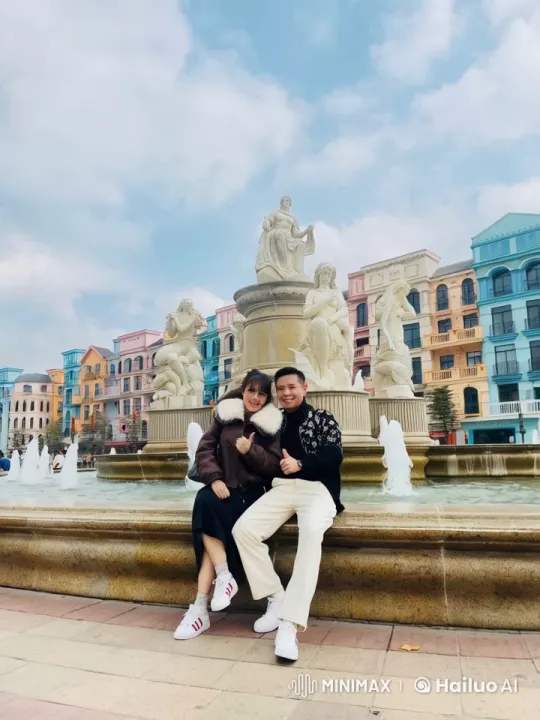 Couple Encourages Each Other at Serene Fountain Scene – AI Generated Video | Hailuo AI