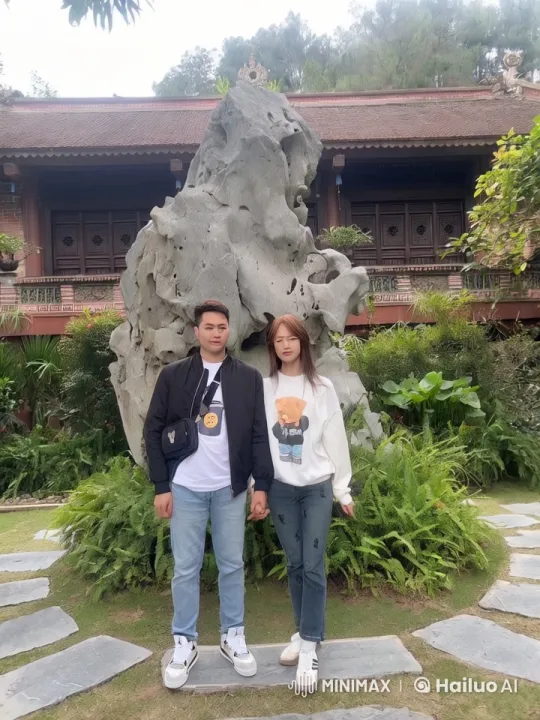 Couple Practicing Kung Fu in Tranquil Garden Setting – AI Generated Video | Hailuo AI