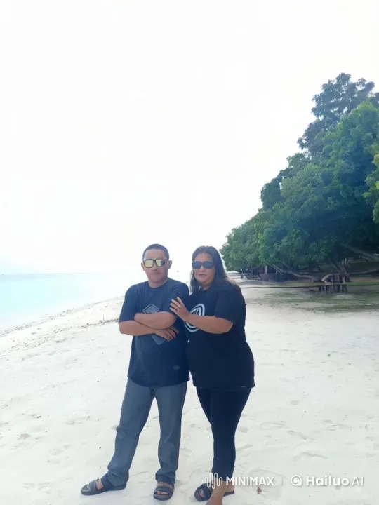 Couple Playfully Practices Kung Fu on Beach – AI Generated Video | Hailuo AI