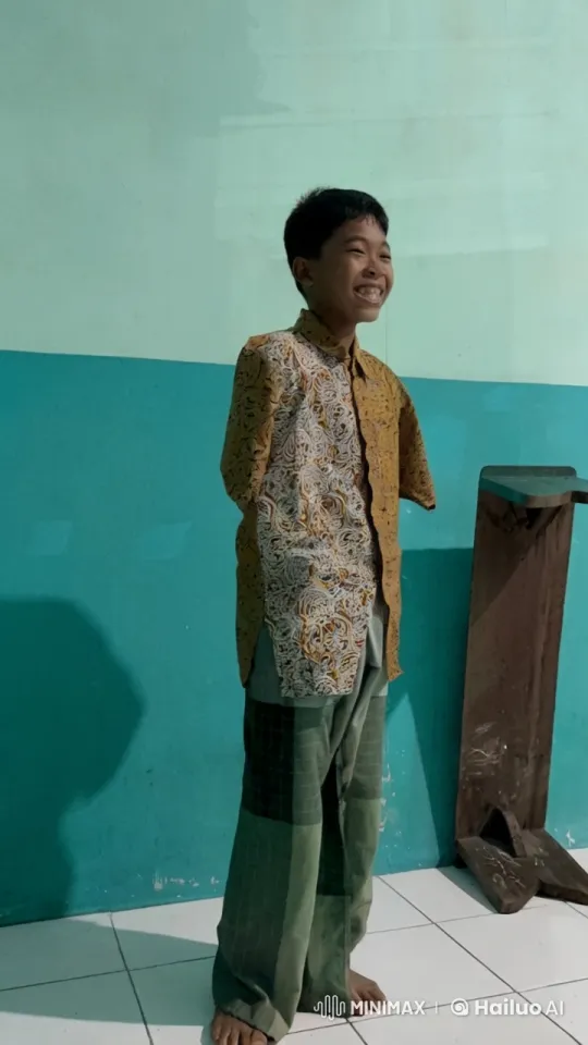 Boy Performs Impressive Kungfu Stunts Against Green Wall – AI Generated Video | Hailuo AI