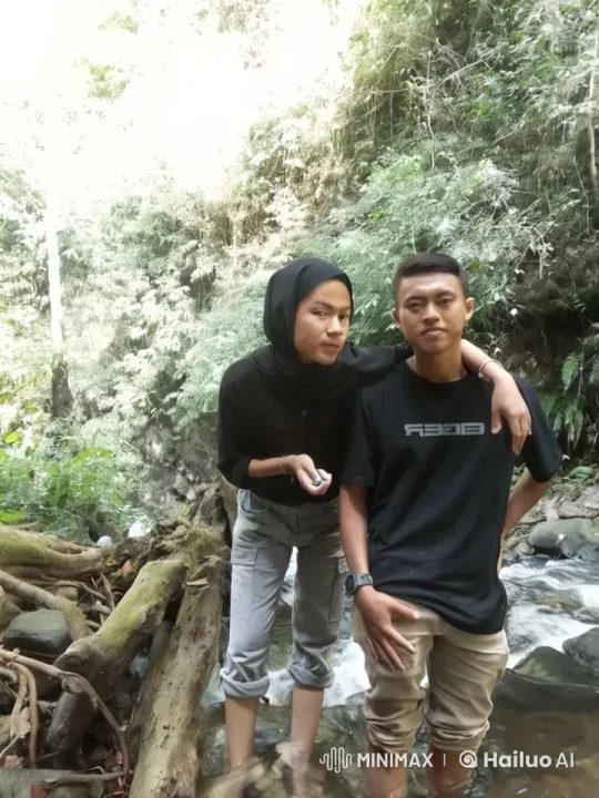 Martial Arts Fight in Lush Forest Stream Setting – AI Generated Video | Hailuo AI