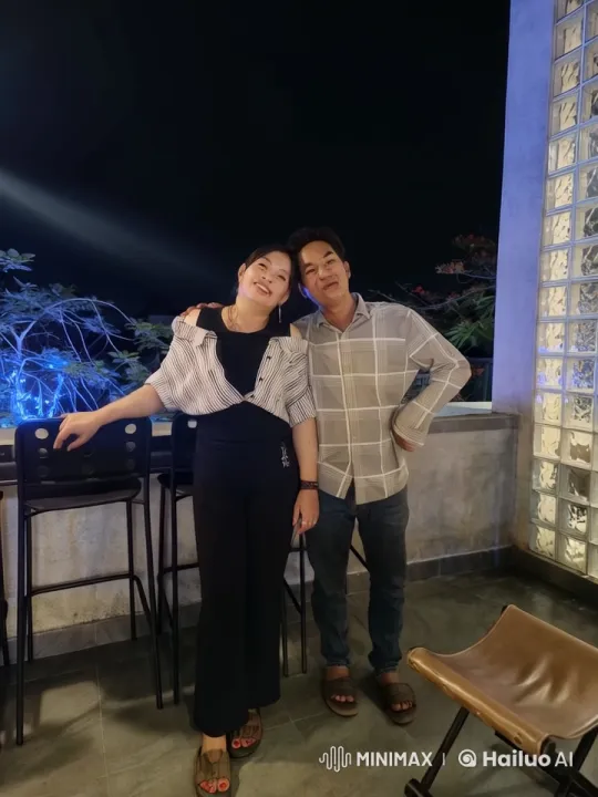 Couple Relaxing on Patio at Night – AI Generated Video | Hailuo AI
