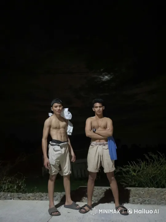 Two Young Men Practice Kung Fu on Concrete Pavement – AI Generated Video | Hailuo AI