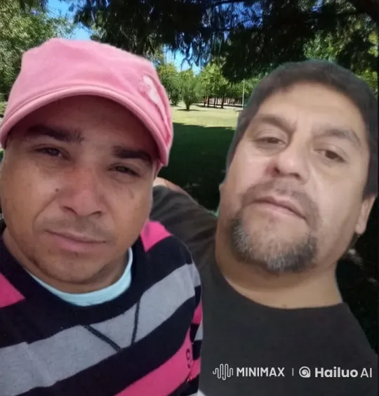 Affectionate Moment Between Two Men in Serene Park – AI Generated Video | Hailuo AI