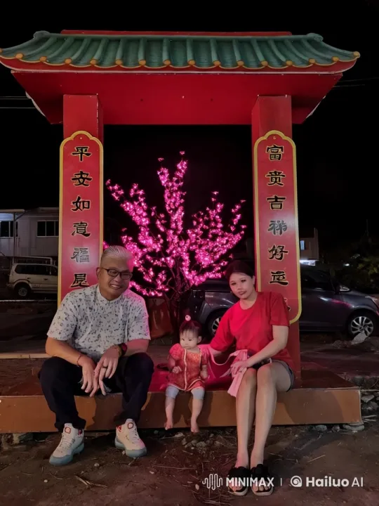 Family Performs Synchronized Kungfu Under Pink-Lit Tree – AI Generated Video | Hailuo AI