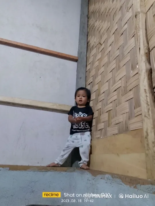 Child Stands Confidently in Rustic Room – AI Generated Video | Hailuo AI