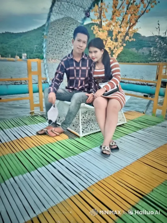 Couple Enjoying Serene Lakeside Swing Moment – AI Generated Video | Hailuo AI