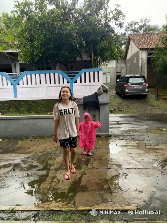 Child in Pink Raincoat Performs Impressive Kung Fu in the Rain – AI Generated Video | Hailuo AI