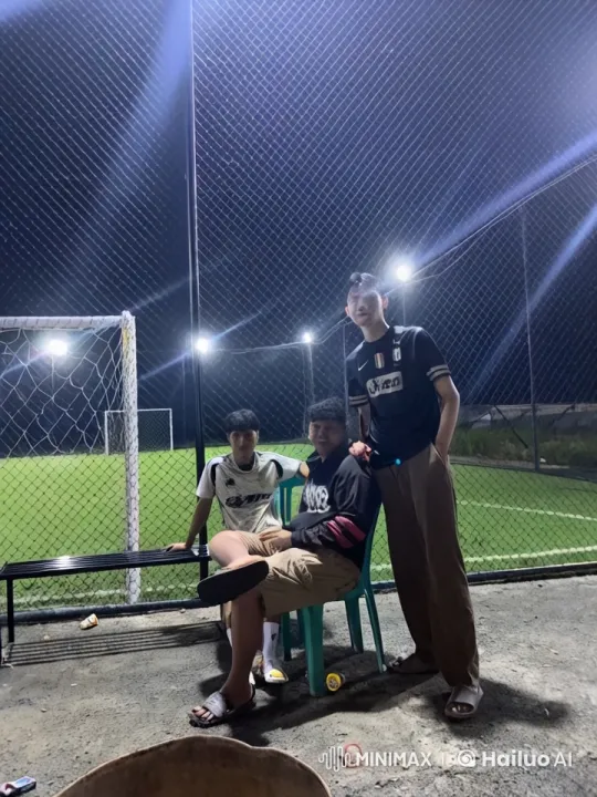 Friends Practicing Martial Arts on Night-Lit Football Field – AI Generated Video | Hailuo AI