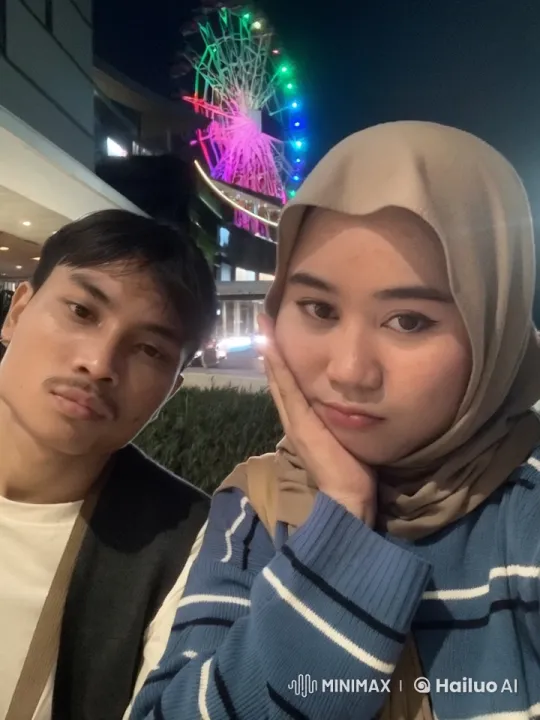 Martial Arts Display with Romantic Twist Against Nighttime Ferris Wheel – AI Generated Video | Hailuo AI