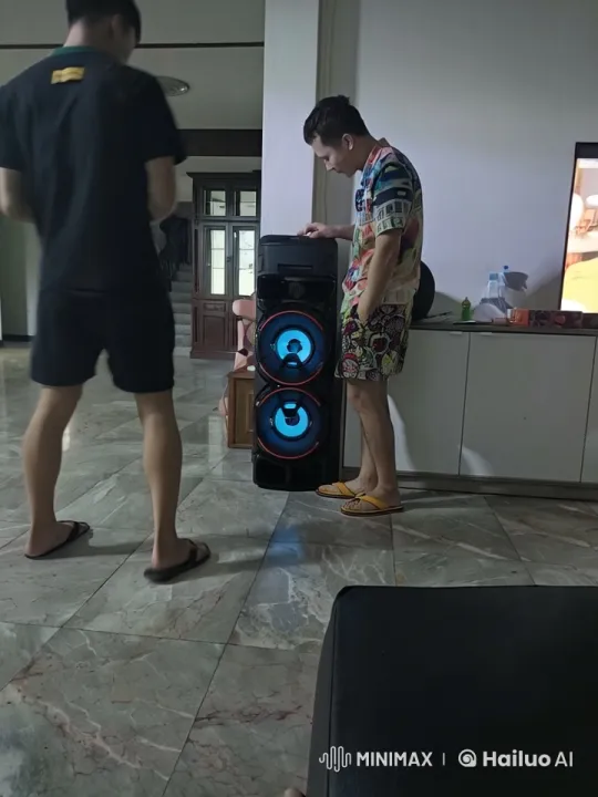 Young Men Experience Immersive Music with Interactive Speaker – AI Generated Video | Hailuo AI