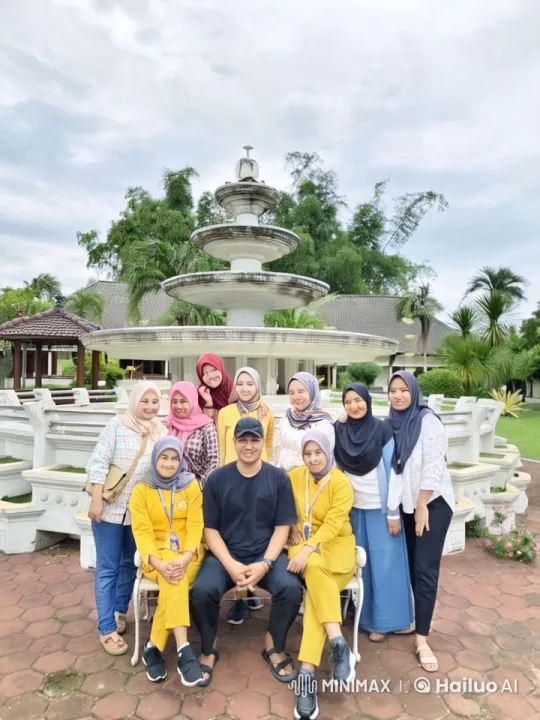 Group Photo in Front of Park Fountain – AI Generated Video | Hailuo AI