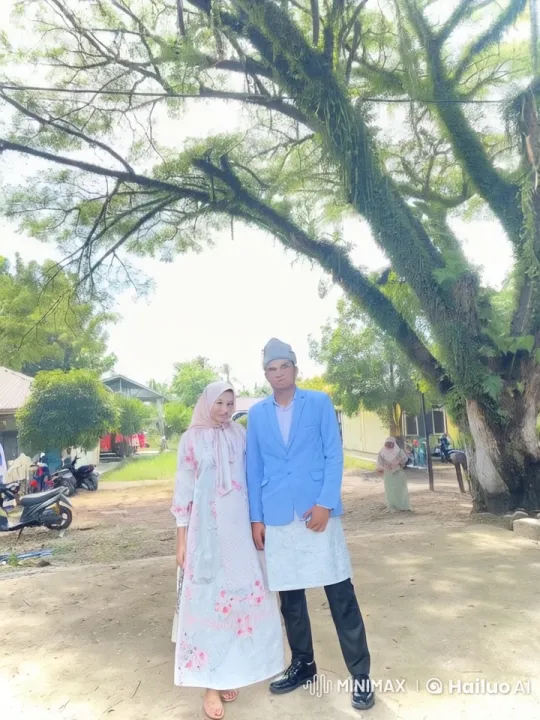 Couple Performs Synchronized Kungfu Display Under a Tree – AI Generated Video | Hailuo AI