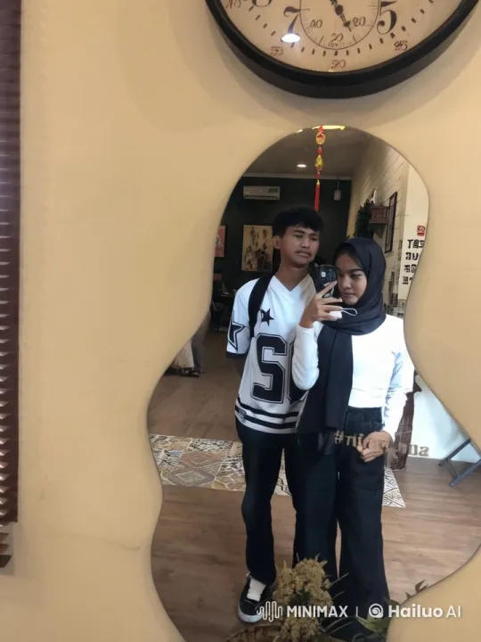 Young Pair Performs Synchronized Kung Fu in Cozy Setting – AI Generated Video | Hailuo AI