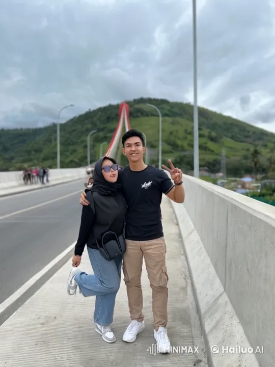 Young Couple Performs Kungfu on Bridge with Scenic View – AI Generated Video | Hailuo AI