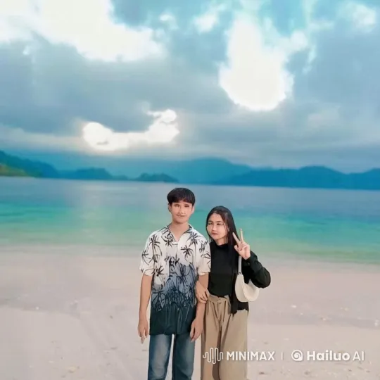Couple's Graceful Kung Fu Display on Beach – AI Generated Video | Hailuo AI