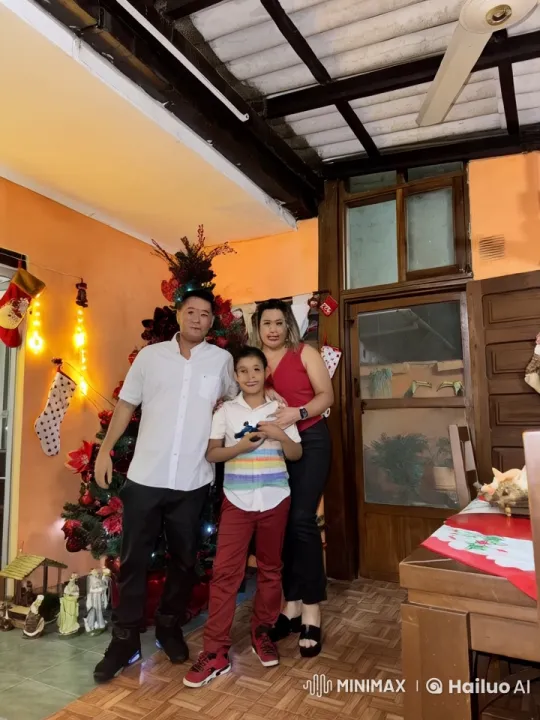 Family Displays Martial Arts Skills by Christmas Tree – AI Generated Video | Hailuo AI