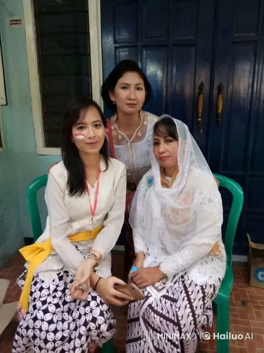 Traditional Attired Women Chatting in Indoor Setting – AI Generated Video | Hailuo AI