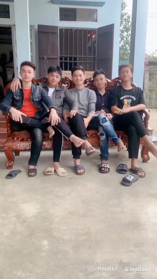 Young Men Enjoy Playful Fight on Bench – AI Generated Video | Hailuo AI