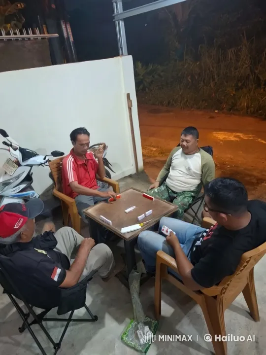 Nighttime Game of Gaple in an Outdoor Garage – AI Generated Video | Hailuo AI