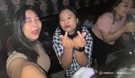 Friends Enjoying Time with Heart Gestures – AI Generated Video | Hailuo AI