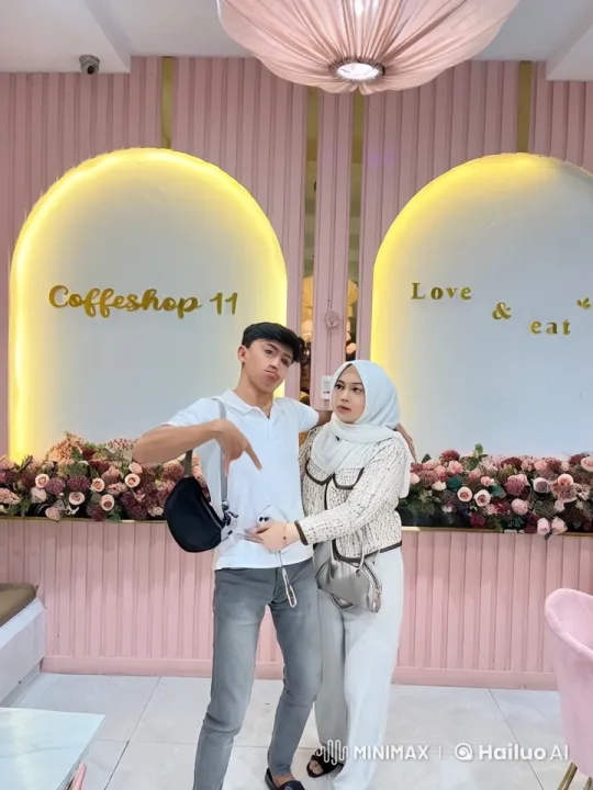 Couple Performs Energetic Kungfu in Stylish Coffeeshop Setting – AI Generated Video | Hailuo AI