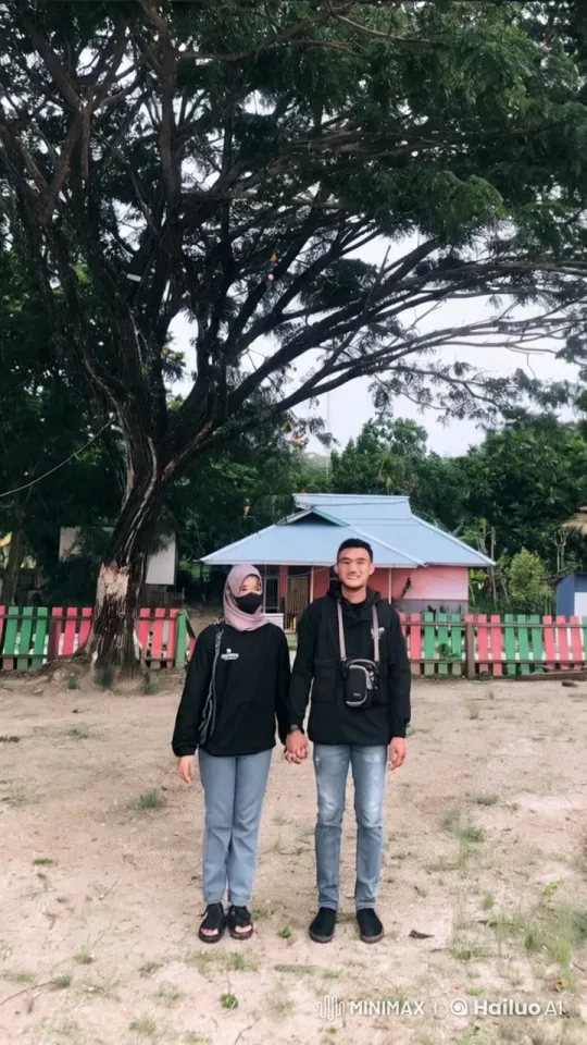 Couple Demonstrates Dynamic Kung Fu Moves in Front of Colorful House – AI Generated Video | Hailuo AI