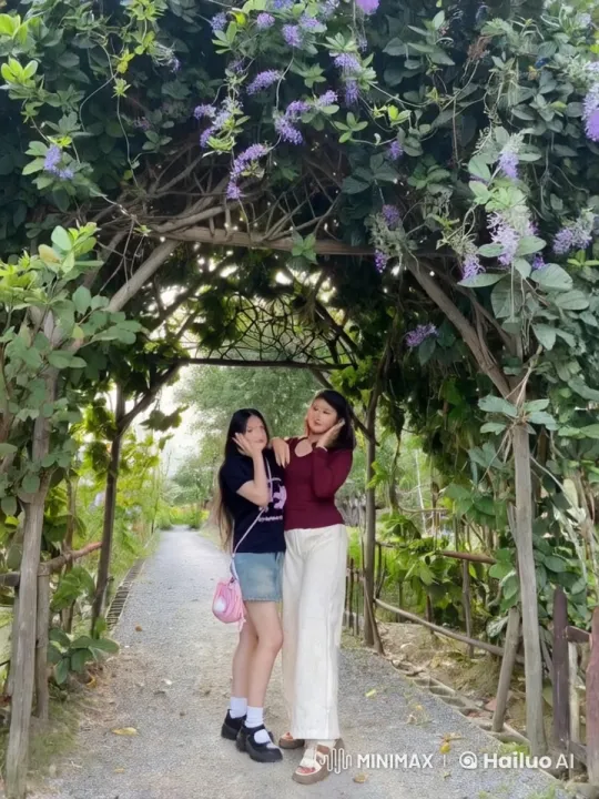 Young Women Perform Graceful Kung Fu in Garden Setting – AI Generated Video | Hailuo AI