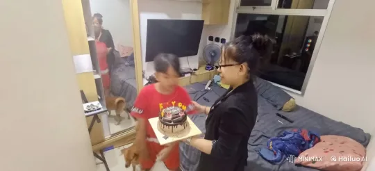 Boy Practicing Martial Arts in Bedroom with Family Watching – AI Generated Video | Hailuo AI