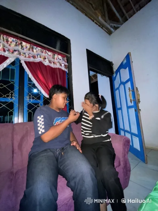 Young Boy and Girl Perform Kungfu in Cozy Room – AI Generated Video | Hailuo AI