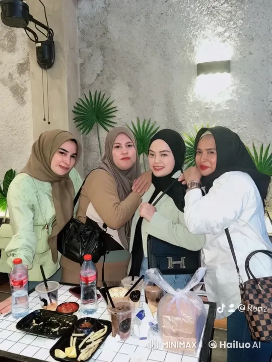 Friends Enjoy Drinks and Laughter in Cozy Indoor Setting – AI Generated Video | Hailuo AI