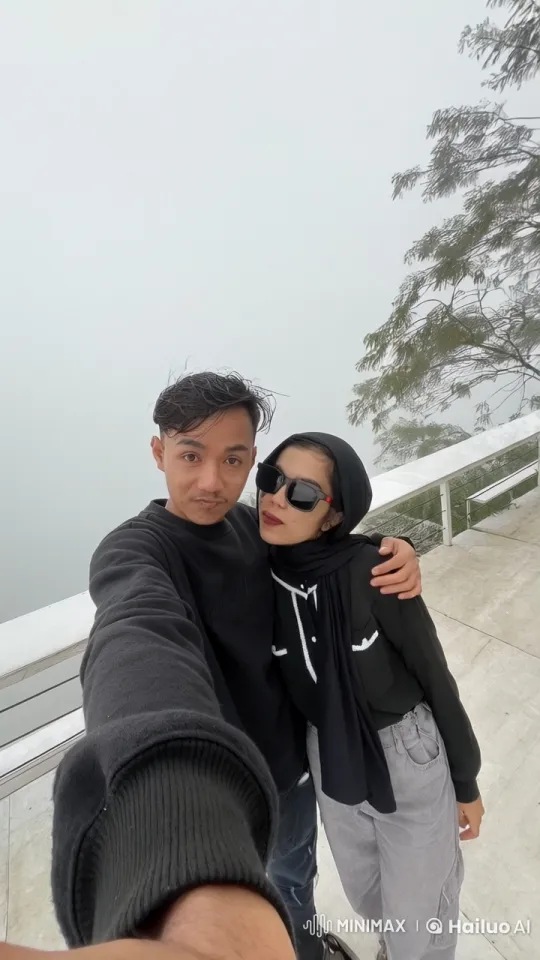 Couple Showcases Dynamic Kung Fu on Foggy Balcony – AI Generated Video | Hailuo AI