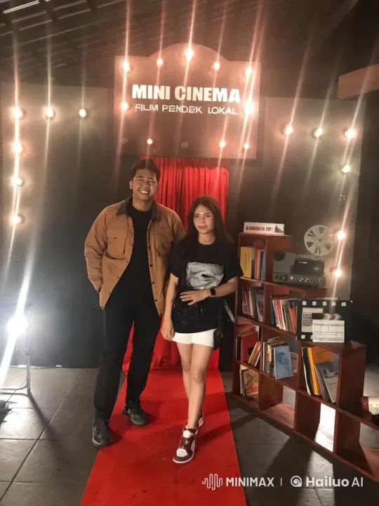 Couple's Playful Kung Fu Fight in Cozy Mini Cinema – AI Generated Video | Hailuo AI